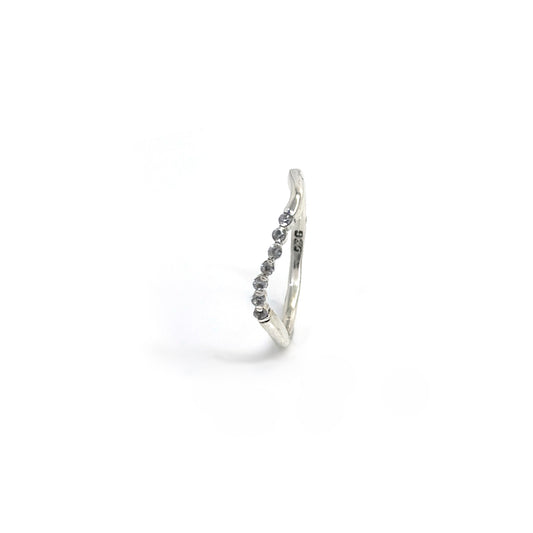 The Tiny Wave Ring (Quartz) by FR | Art Jewellery features a delicate silver curved band with sparkling diamonds set along the top half, ideal for personalised stackable ring collections.