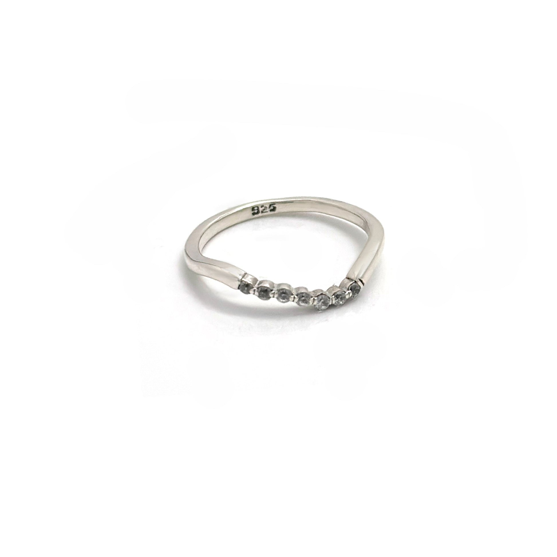 The Tiny Wave Ring (Quartz) by FR | Art Jewellery features a delicate silver curved band with sparkling diamonds set along the top half, ideal for personalised stackable ring collections.