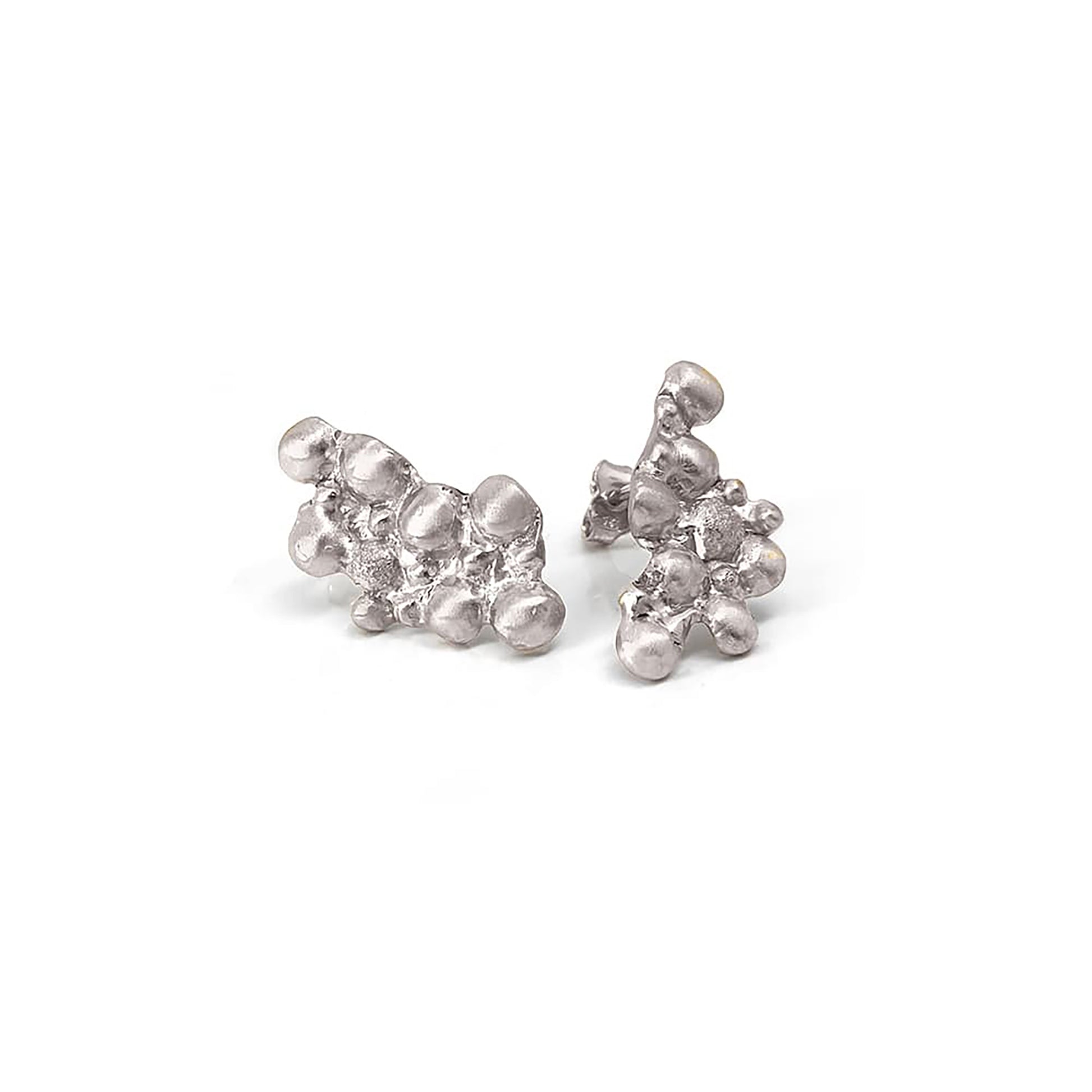 A pair of irregularly-shaped, gold-plated nugget earrings with a bumpy, textured surface on a white background. The earrings have a shiny, polished finish and resemble natural gold formations. Perfect for those who appreciate handmade jewellery's unique charm from FR | Art Jewellery's Pearl Earrings.