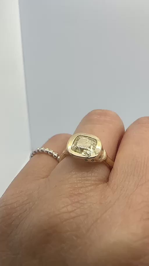 Video of the handmade 9ct gold yellow cushion lab-grown diamond ring being worn on the hand